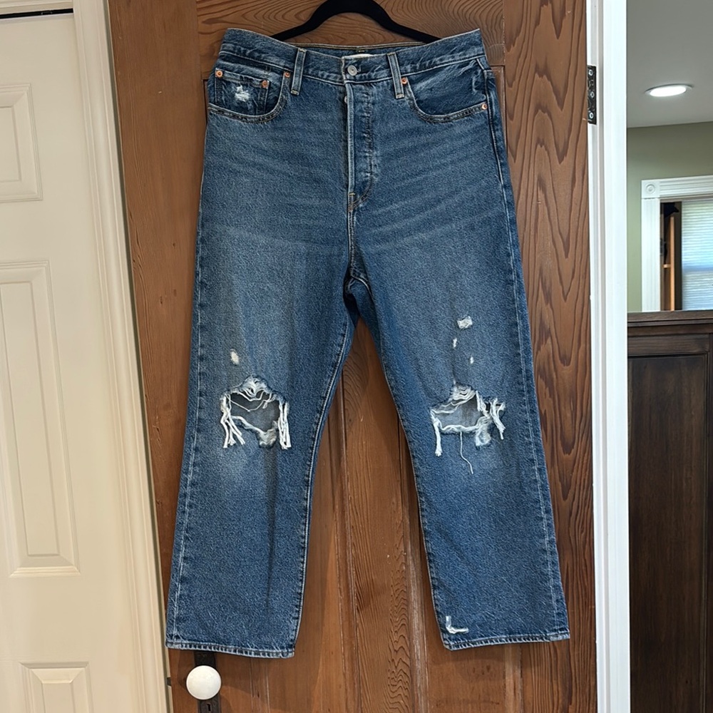 Levi’s Relaxed Blue Distressed Jeans with Knee Rips